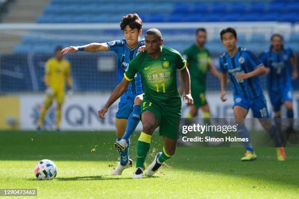 Fernando of Beijing FC passes the ball during the AFC Champions League quarter final match between Ulsan Hyundai and Beijing FC at the Al Janoub...