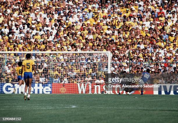 Paolo Rossi of Italy scores the opening goal during the World Cup Spain 1982 match between Italy and Brazil at Estadio de Sarrià on June 5, 1982 in...