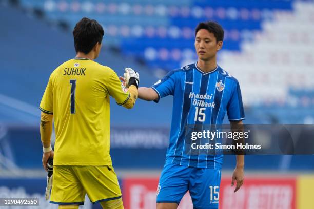 Jo Su-huk and Jeong Seung-Hyeon of Ulsan Hyundai congratulate each other the AFC Champions League quarter final match between Ulsan Hyundai and...