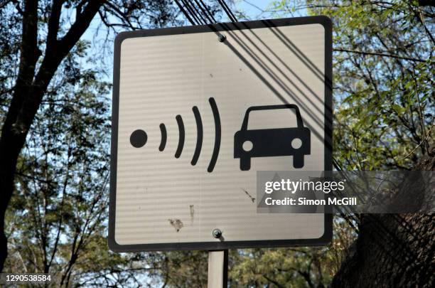 speed camera or radar ahead traffic warning sign in mexico city, mexico - lasergun stockfoto's en -beelden