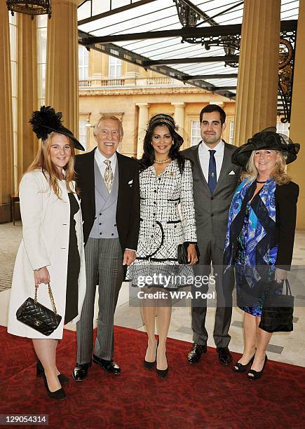 Sir Bruce Forsyth and his wife Wilnelia arrive with his children Charlotte, Jonathan and Laura at Buckingham Palace where he will be knighted by...