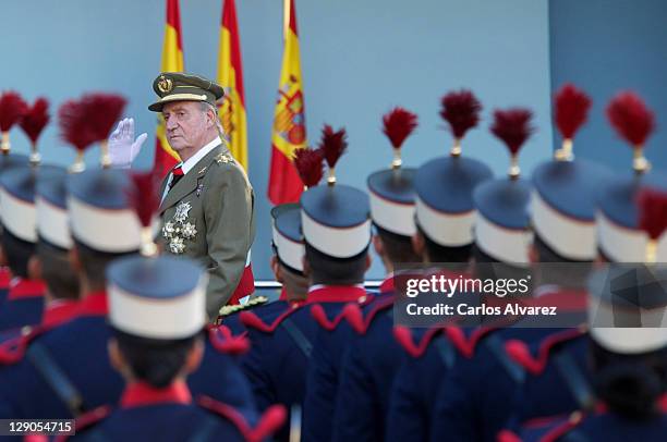 King Juan Carlos of Spain attends the National Day Military Parade on October 12, 2011 in Madrid, Spain.