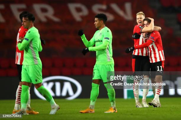 Timo Baumgartl of PSV Eindhoven celebrates with Adrian Fein of PSV Eindhoven after the full time whistle during the UEFA Europa League Group E stage...