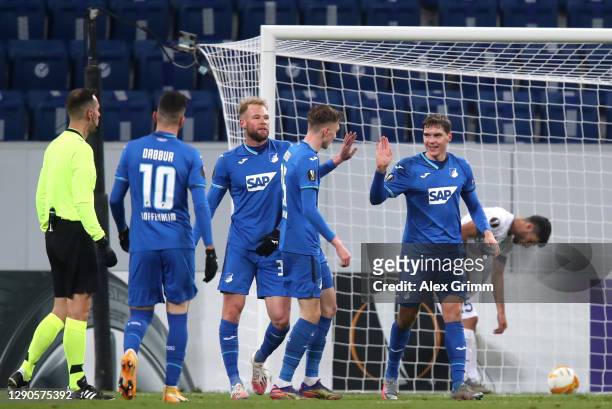 Robert Skov of TSG 1899 Hoffenheim celebrates with his team after he scores their team's second goal during the UEFA Europa League Group L stage...