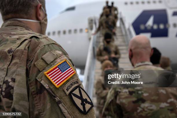 Army soldiers return home from a 9-month deployment to Afghanistan on December 10, 2020 at Fort Drum, New York. The 10th Mountain Division soldiers...