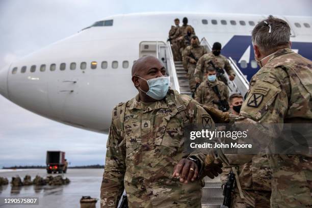 Army soldiers return home from a 9-month deployment to Afghanistan on December 10, 2020 at Fort Drum, New York. The 10th Mountain Division soldiers...