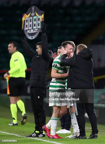 David Turnbull of Celtic is embraced by Neil Lennon, Manager of Celtic as he is substituted during the UEFA Europa League Group H stage match between...