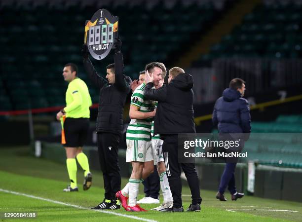 David Turnbull of Celtic is embraced by Neil Lennon, Manager of Celtic as he is substituted during the UEFA Europa League Group H stage match between...