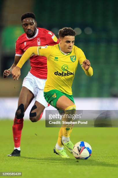 Max Aarons of Norwich City and Sammy Ameobi of Nottingham Forest compete for the ball during the Sky Bet Championship match between Norwich City and...