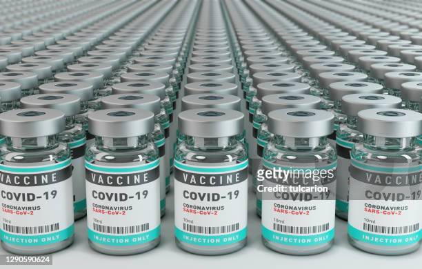 vaccine covid-19 corona virus concept with large group of bottles vials. - large group of objects stock pictures, royalty-free photos & images