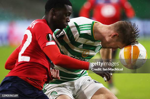 Timothy Weah of LOSC Lille vies with Kristoffer Ajer of Celtic during the UEFA Europa League Group H stage match between Celtic and LOSC Lille at...