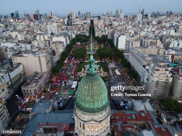 Aerial view of demonstrations of pro-choice and anti abortion activists outside the National Congress as Deputies vote on a bill to legalize abortion...