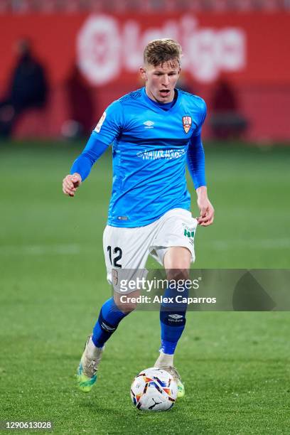 Mateusz Bogusz of UD Logrones runs with the ball during the LaLiga SmartBank match between Girona FC and UD Logrones at Montilivi Stadium on December...