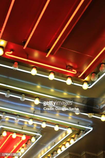 illuminated florescent marquee lights - casino background stock pictures, royalty-free photos & images