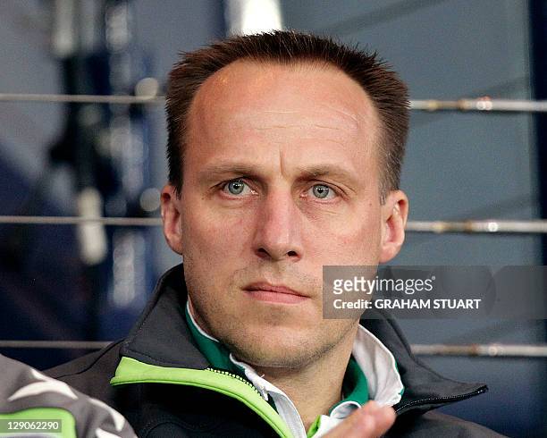 Picture taken on September 6, 2011 of Lithuania's manager Raimondas Zutautas watching his team play Scotland in a Euro 2012 qualifier football match...