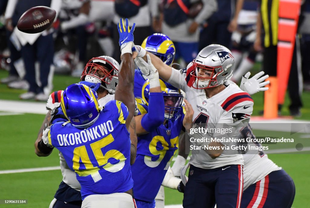 Los Angeles Rams defense pressures quarterback Jarrett Stidham of the