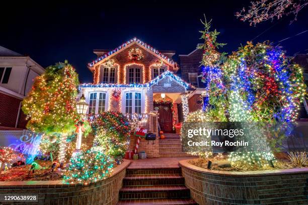 House is decorated for the Christmas holiday season in the Dyker Heights neighborhood in Brooklyn on December 11, 2020 in New York City. Many holiday...