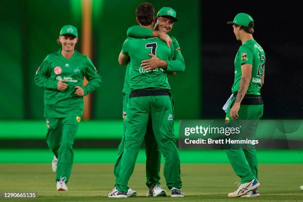 Nathan Coulter-Nile of the Stars celebrates with team mates after taking the wicket of Jack Wood of the Heat during the Big Bash League match between...