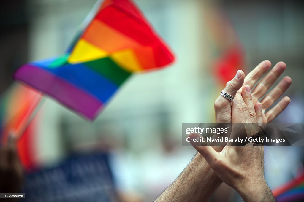 LGBT rinbow flag and clapping hands