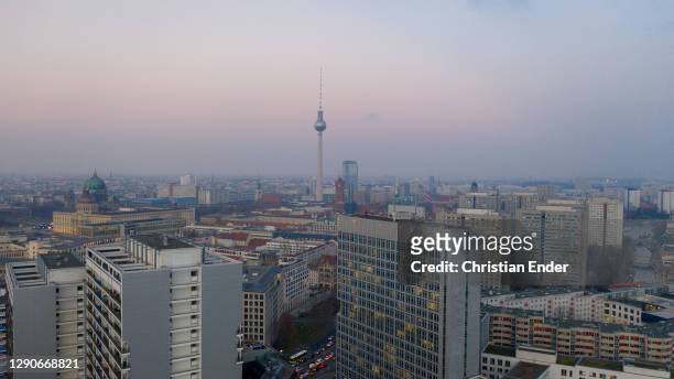 In this aerial view the television tower on Alexanderplatz and the Berliner Schloss city palace stand during the second wave of the coronavirus...