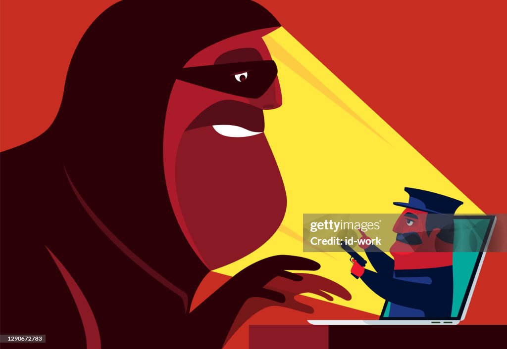 Armed security guard pointing hacker via laptop