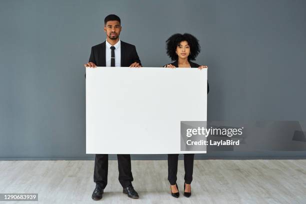 35,065 Two People Holding Signs Stock Photos, High-Res Pictures, and ...