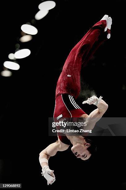 Jonathan Horton of the United States competes on the Horizontal Bar aparatus in the Men's Team Final during day six of the Artistic Gymnastics World...