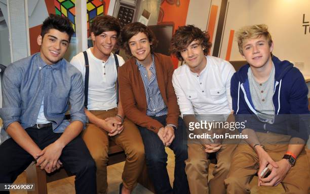 Zayn Malik, Louis Tomlinson, Harry Styles, Liam Payne and Niall Horan of One Direction launch their new Nokia handsets at The Carphone Warehouse on...