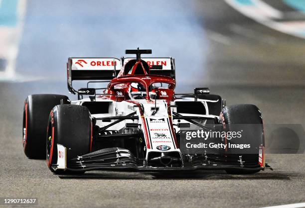 Fire emerges from the car of Kimi Raikkonen of Finland driving the Alfa Romeo Racing C39 Ferrari during practice ahead of the F1 Grand Prix of Abu...