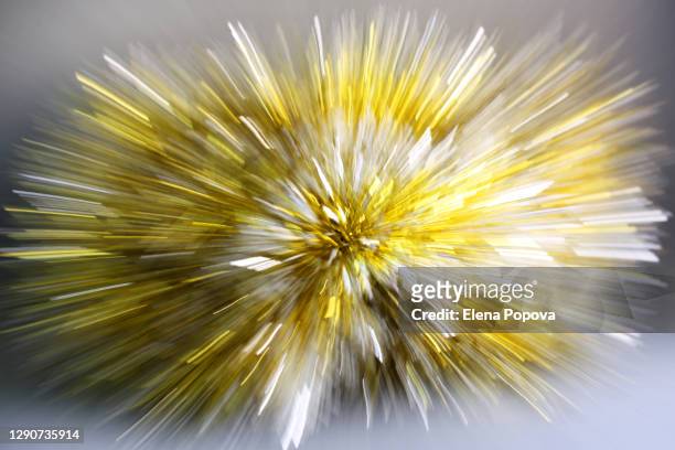 festive background of yellow illuminating color, shine and glittering - fast shutter speed foto e immagini stock