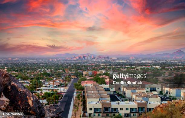 phoenix, arizona skyline at dusk - phoenix arizona stock pictures, royalty-free photos & images