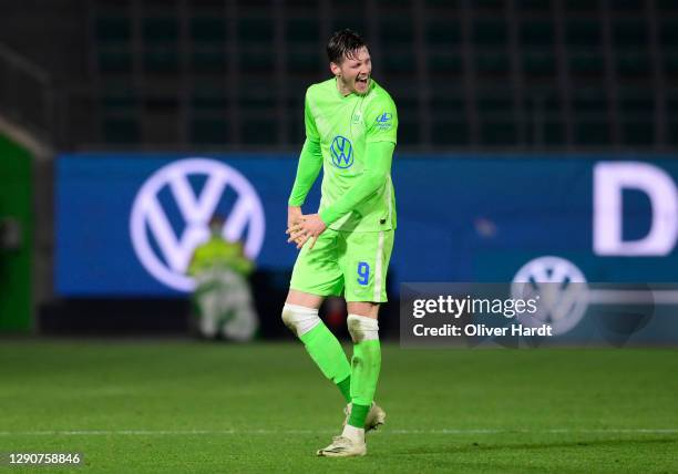 Wout Weghorst of VfL Wolfsburg celebrates after scoring their sides second goal during the Bundesliga match between VfL Wolfsburg and Eintracht...