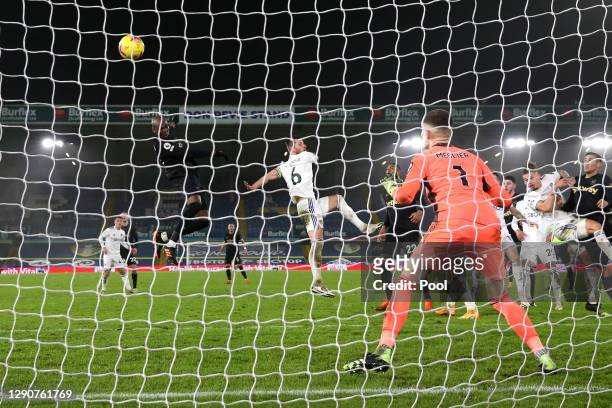 Angelo Ogbonna of West Ham United scores their sides second goal past Illan Meslier of Leeds United whilst under pressure from Liam Cooper of Leeds...