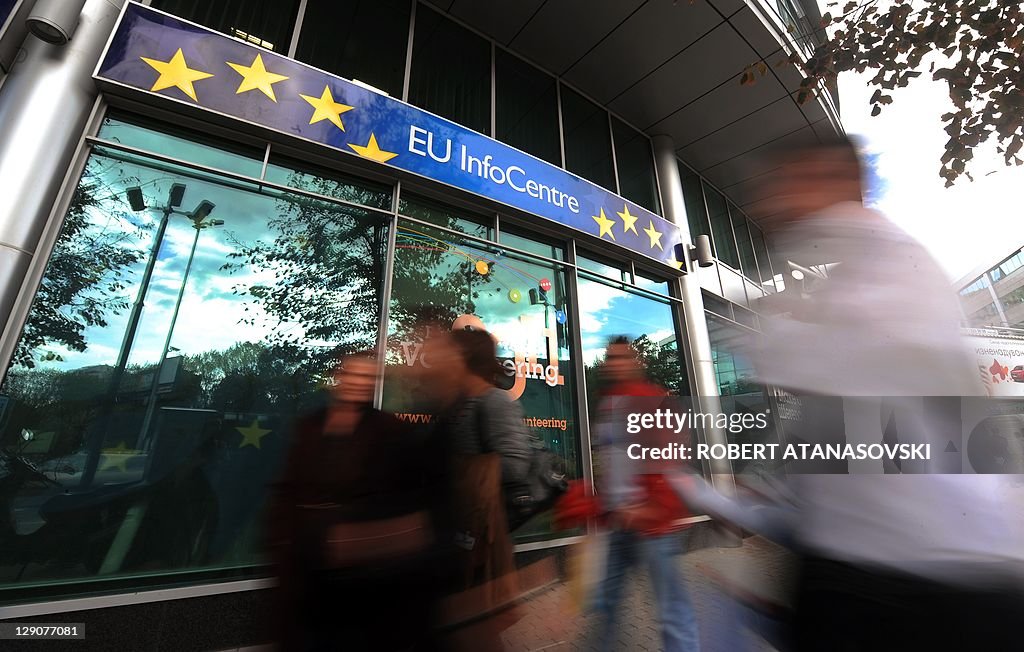 People walk pass the European Commission