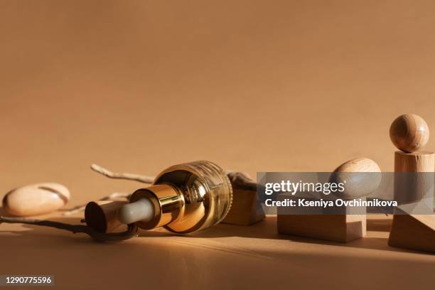 composition with bottles of essential oils on table. natural cosmetics - antiseptic cream stock pictures, royalty-free photos & images