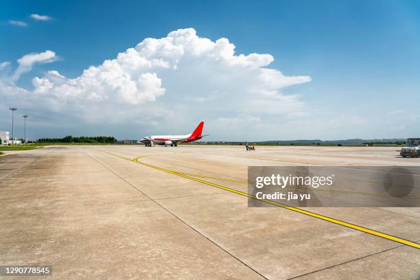 runway of zhanjiang airport, guangdong province. china. - tarmac airport stock pictures, royalty-free photos & images