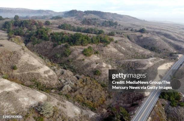 Burn scars from the CZU Lightning Complex Fire are seen from this drone view along Highway 1 in Davenport, Calif., on Wednesday, Dec. 9, 2020. The...