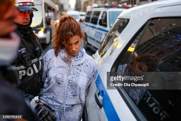 Woman later identified as Kathleen Casillo, is arrested by the New York City Police Department during a U.S. Immigration and Customs Enforcement...
