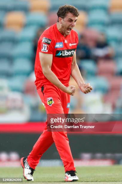 Peter Hatzoglou of the Renegades celebrates the wicket of Cameron Bancroft of the Perth Scorchers during the Big Bash League match between the...