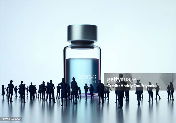 huge covid-19 vaccine bottle appearance. - screening event of nbcs american ninja warrior red carpet stockfoto's en -beelden