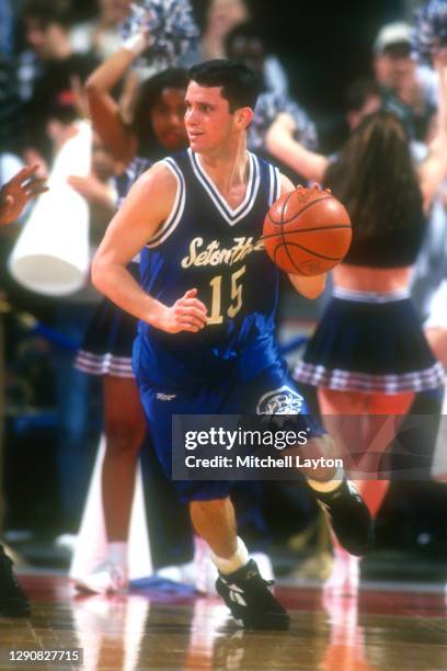 Danny Hurley of the Seton Hall Pirates dribbles the ball during a college basketball game against the Georgetown Hoyas on March 1, 1995 at USAir...