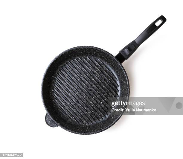 black iron pan. isolated. - black and white food 個照片及圖片檔