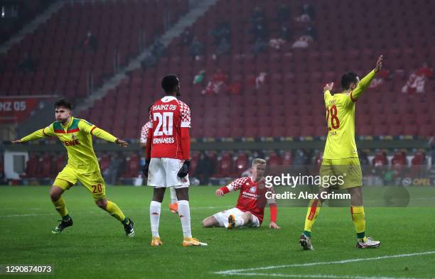 Elvis Rexhbecaj of 1. FC Koeln celebrates after scoring his team's first goal during the Bundesliga match between 1. FSV Mainz 05 and 1. FC Koeln at...