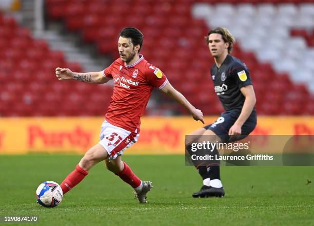 Harry Arter of Nottingham Forest breaks away from Mads Bech Sorensen of Brentford during the Sky Bet Championship match between Nottingham Forest and...