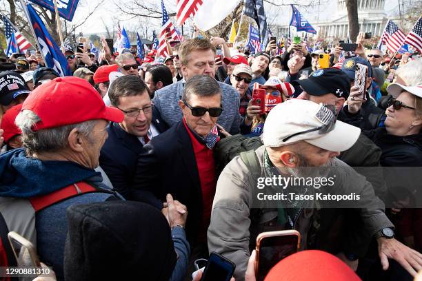 Former General Michael Flynn, President Donald Trump’s recently pardoned national security adviser, arrives to speak during a protest of the outcome...