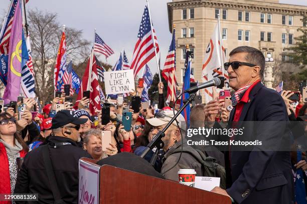 Former General Michael Flynn, President Donald Trump’s recently pardoned national security adviser, speaks during a protest of the outcome of the...