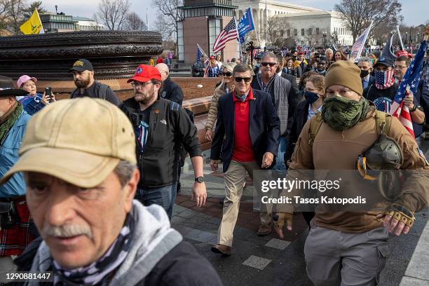 Former General Michael Flynn, President Donald Trump’s recently pardoned national security adviser, departs a protest of the outcome of the 2020...