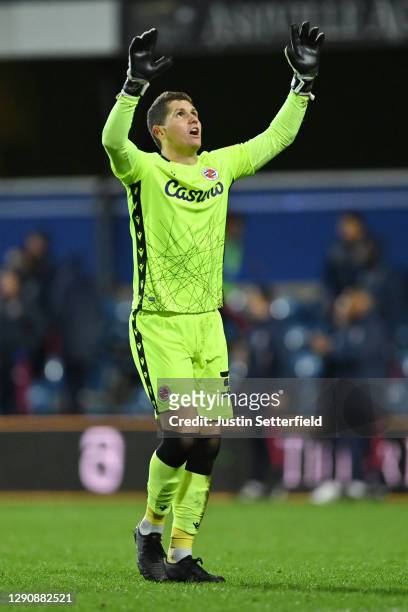 Rafael Cabral Barbosa of Reading celebrates after Michael Olise of Reading scores their team's first goal during the Sky Bet Championship match...