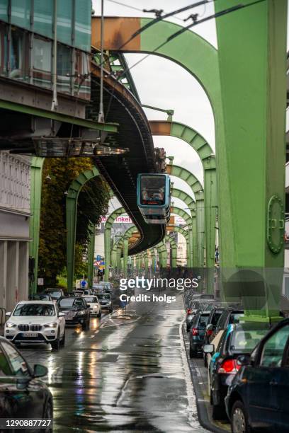 wuppertal schwebebahn (wuppertal suspension railway) in the ruhr area of germany - wuppertal stock pictures, royalty-free photos & images