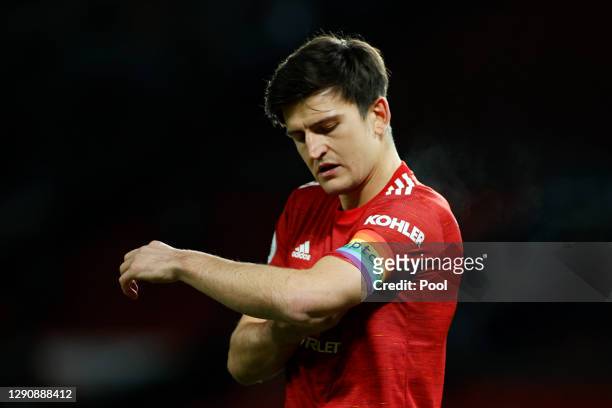 Harry Maguire of Manchester United wears a rainbow captains armband in support of the Stonewall Rainbow Laces campaign during the Premier League...